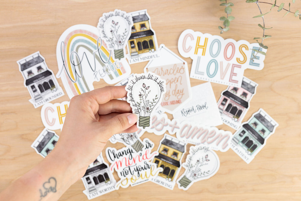 LET IT SHINE · Transparent Sticker - Damrell Designs